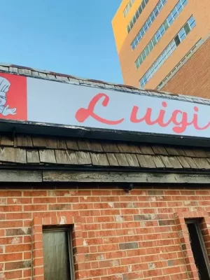 Luigis - building sign cabinet